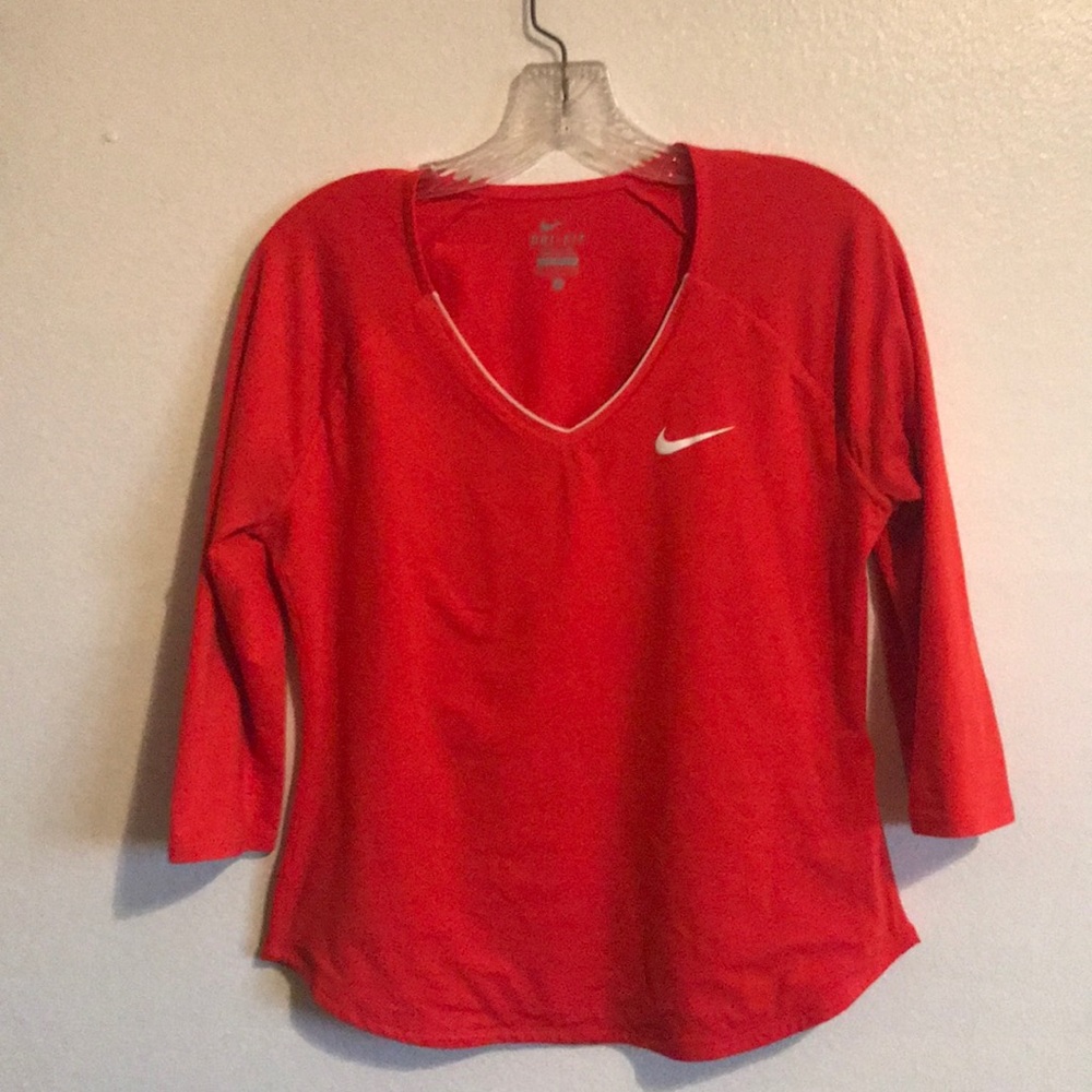 Orange Nike shirt